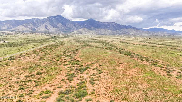 a view of a lake with mountains in the background