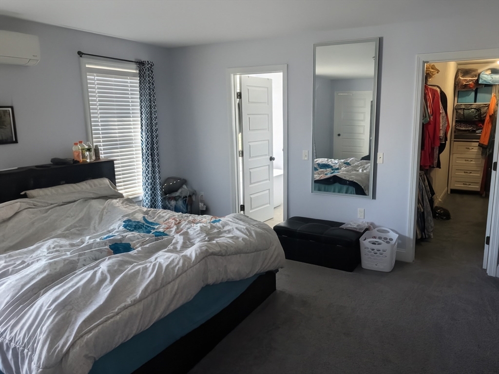 456 Ridge Road Athol, MA 01331 - Photo 16 of 26 a bedroom with double bed and a window