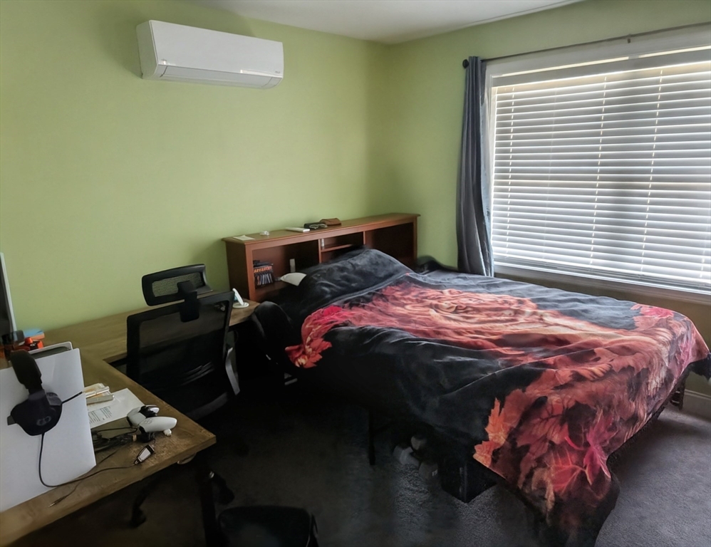 456 Ridge Road Athol, MA 01331 - Photo 19 of 26 a bedroom with a bed and a window