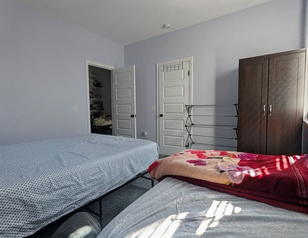 456 Ridge Road Athol, MA 01331 - Photo 22 of 26 a bedroom with a bed and a closet