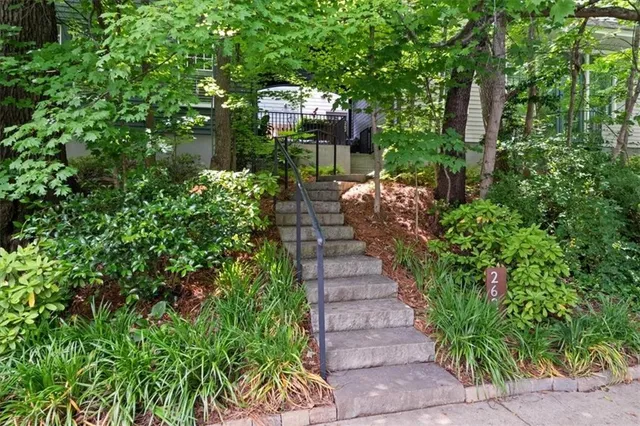a view of a back yard of the wooden fence