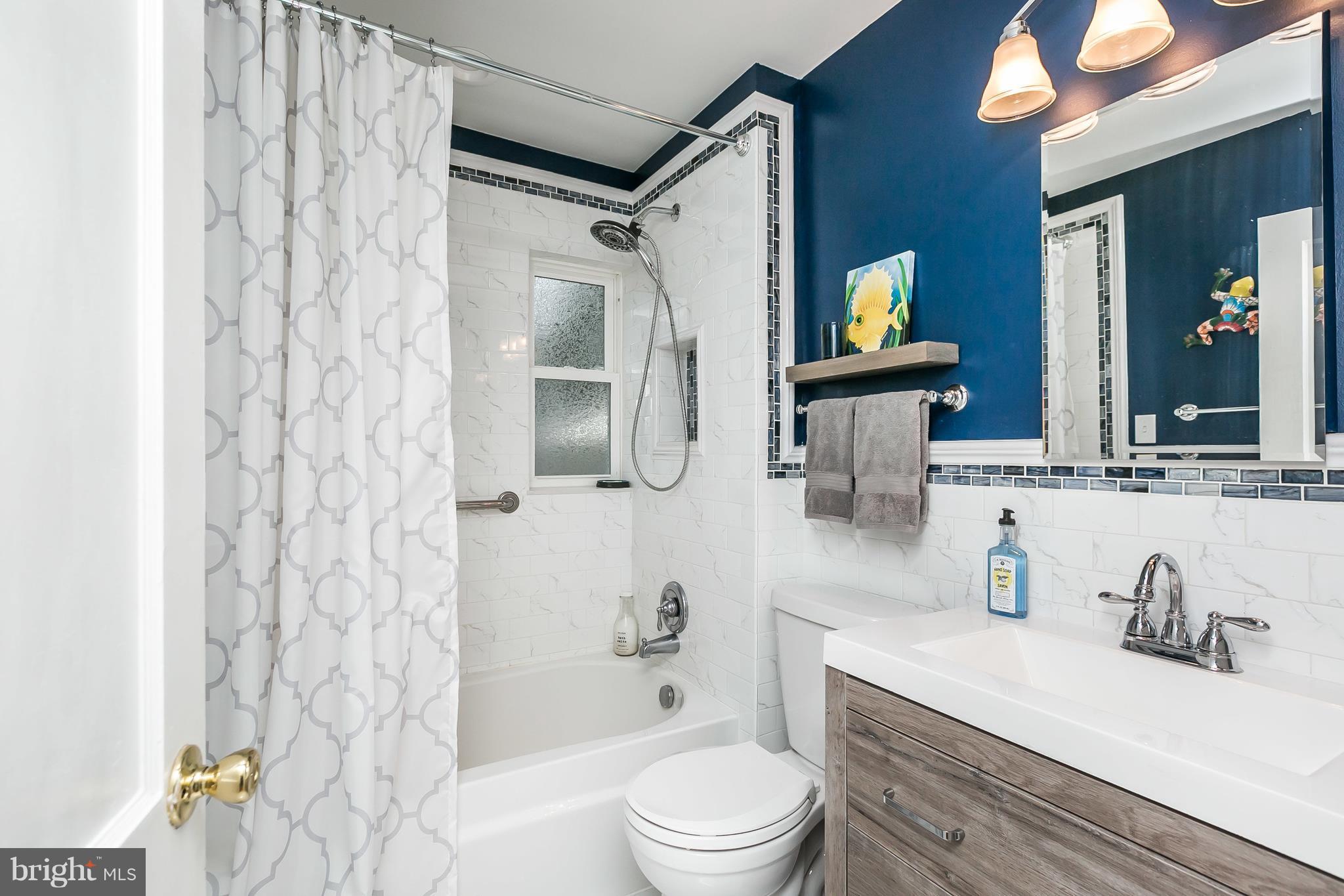 5714 Oakshire Road Baltimore, MD 21209 - Photo 16 of 30 A very pretty shared bath on the main level