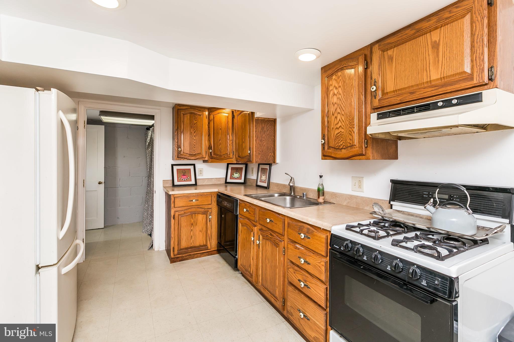 5714 Oakshire Road Baltimore, MD 21209 - Photo 19 of 30 Kitchen in lower level for parties/inlaw suite