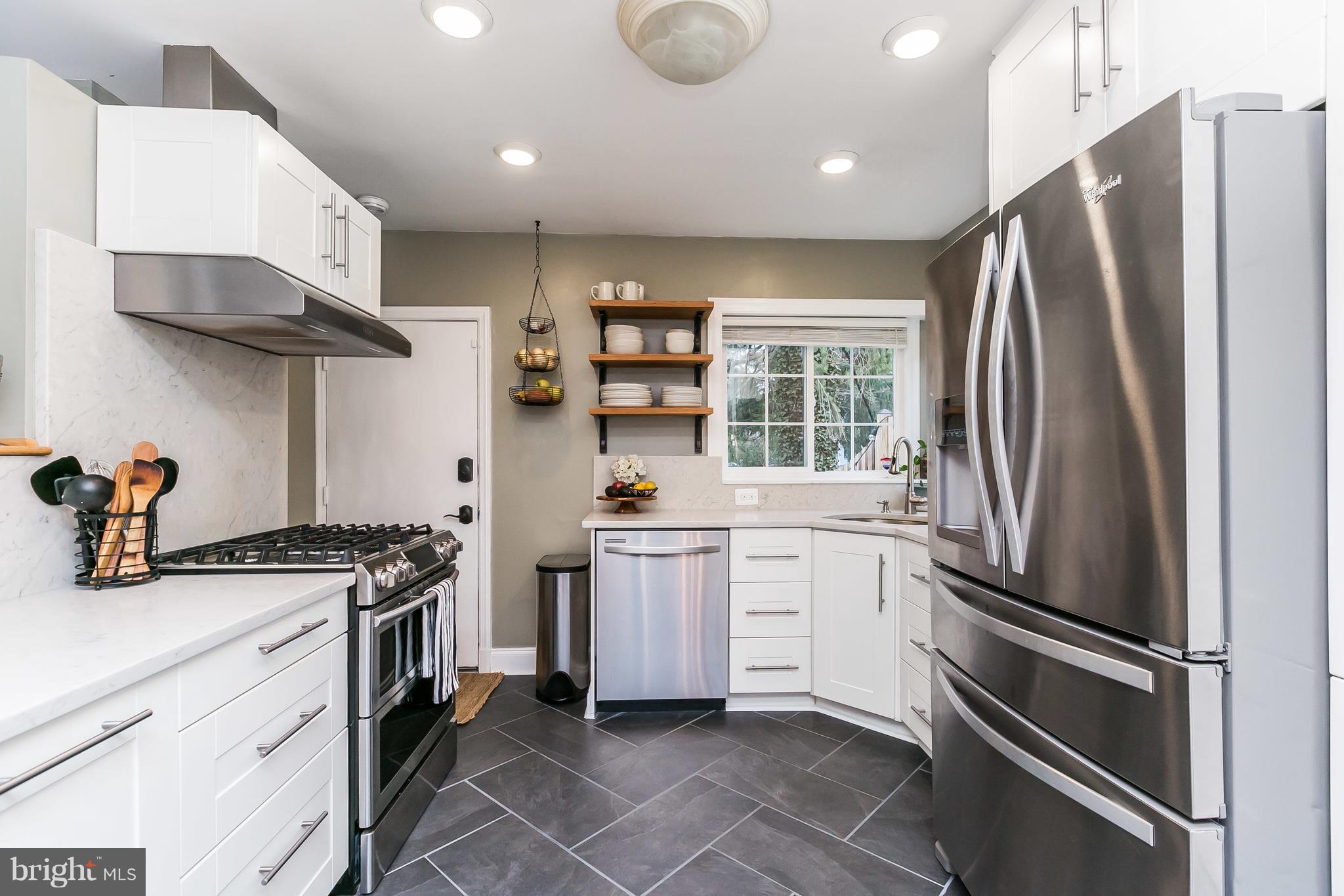 5714 Oakshire Road Baltimore, MD 21209 - Photo 10 of 30 Herringbone ceramic tile floors are gorgeous