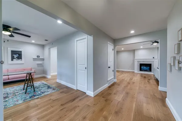 a view of a livingroom with furniture and a fireplace