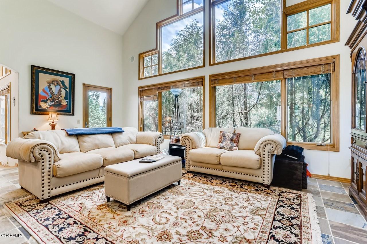 145 Hereford Road Edwards, CO 81632 - Photo 13 of 24 a living room with furniture and a large window