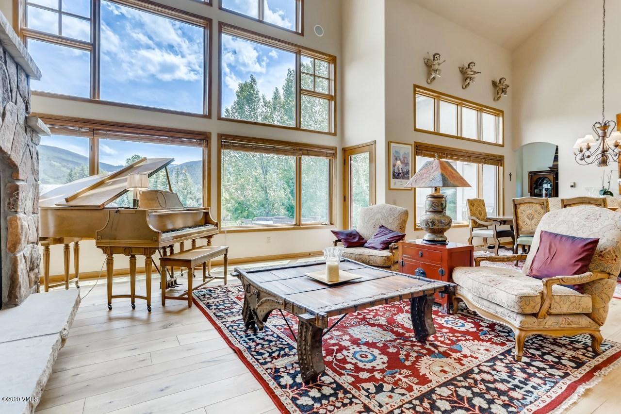 145 Hereford Road Edwards, CO 81632 - Photo 5 of 24 a living room filled with furniture and a large window