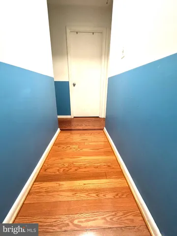 a view of a big room with wooden floor