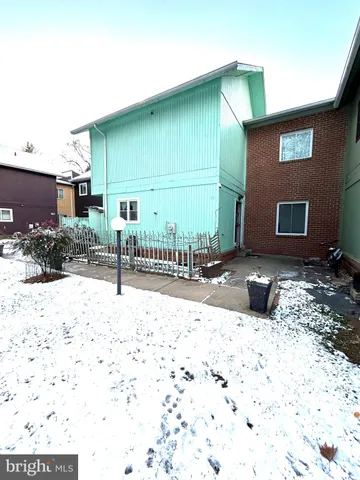 a view of a backyard of the house