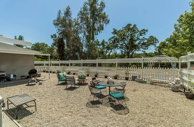 a view of a lake with a patio and a patio