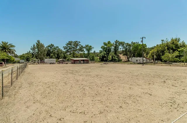 a view of a lake with a yard