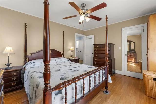 a bed room with a bed and a chandelier