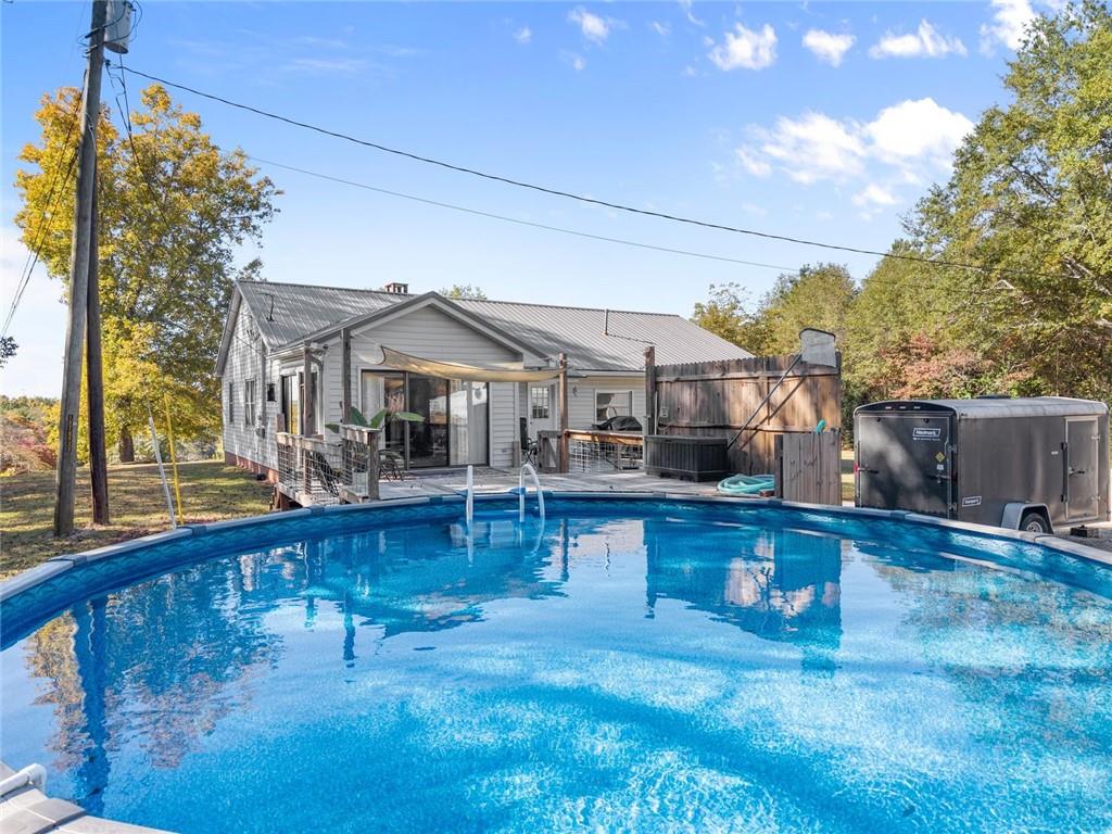 3089 Highway 17 Alternate Toccoa, GA 30577 - Photo 36 of 51 a front view of a house with a garden