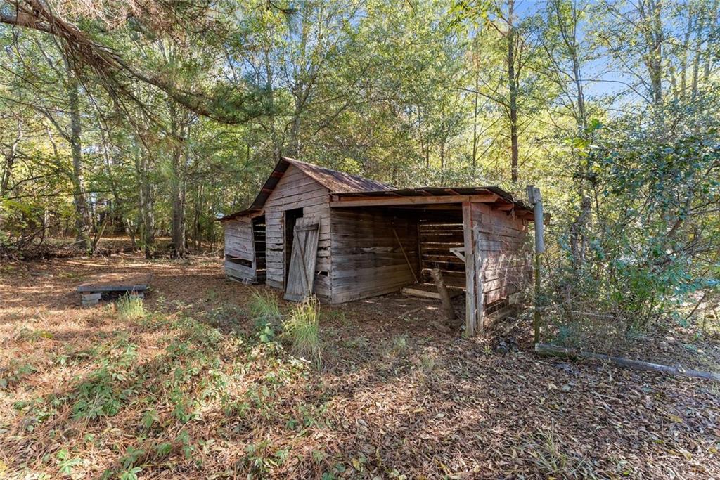 3089 Highway 17 Alternate Toccoa, GA 30577 - Photo 44 of 51 a view of a house with a yard