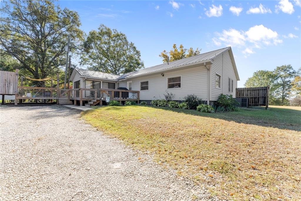 3089 Highway 17 Alternate Toccoa, GA 30577 - Photo 45 of 51 a view of a house with a yard
