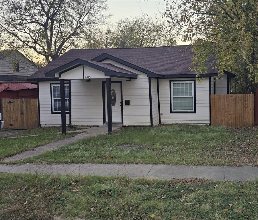 405 Southwest 6th Street Grand Prairie, TX 75051 - Photo 2 of 16 Bungalow-style home with roof with shingles