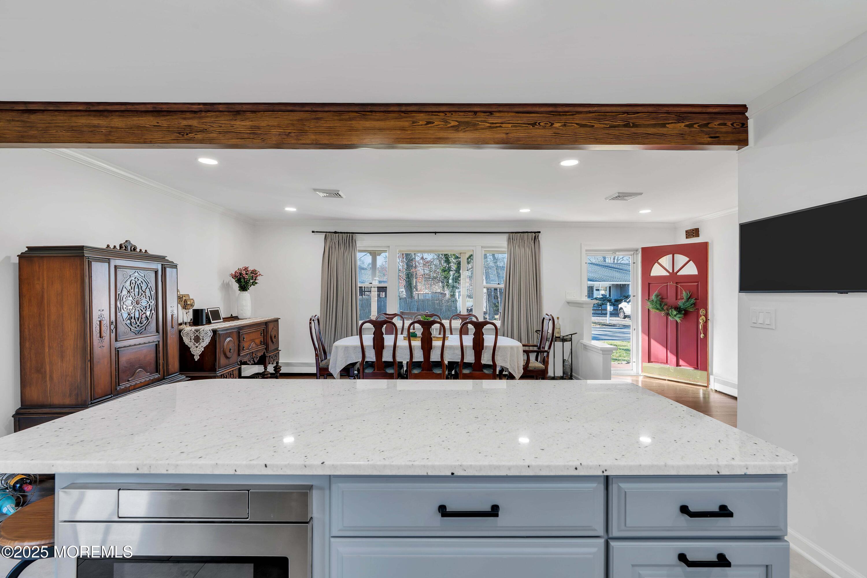 520 Windsor Street Forked River, NJ 08731 - Photo 15 of 36 a view of a room with shelves and wooden floor