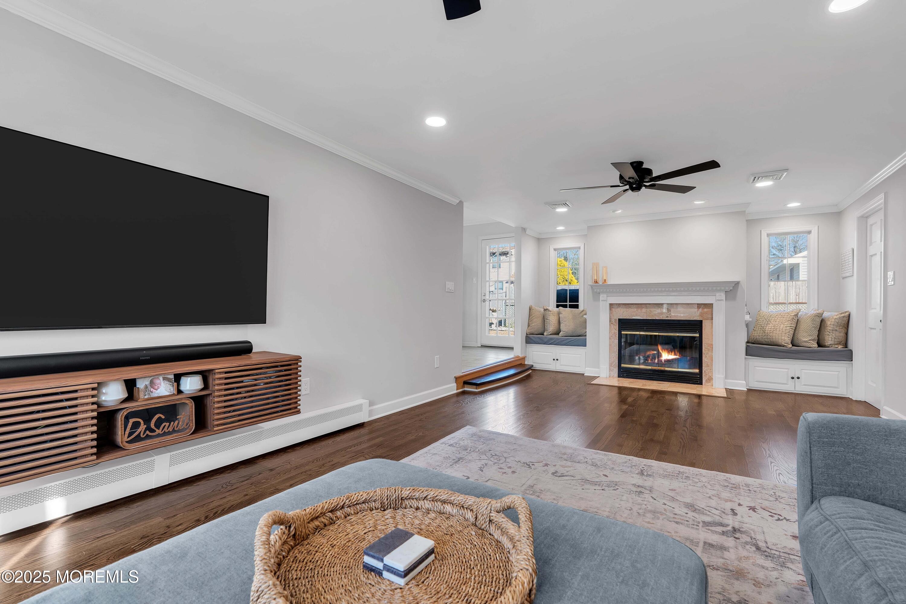 520 Windsor Street Forked River, NJ 08731 - Photo 2 of 36 a living room with furniture and a fireplace