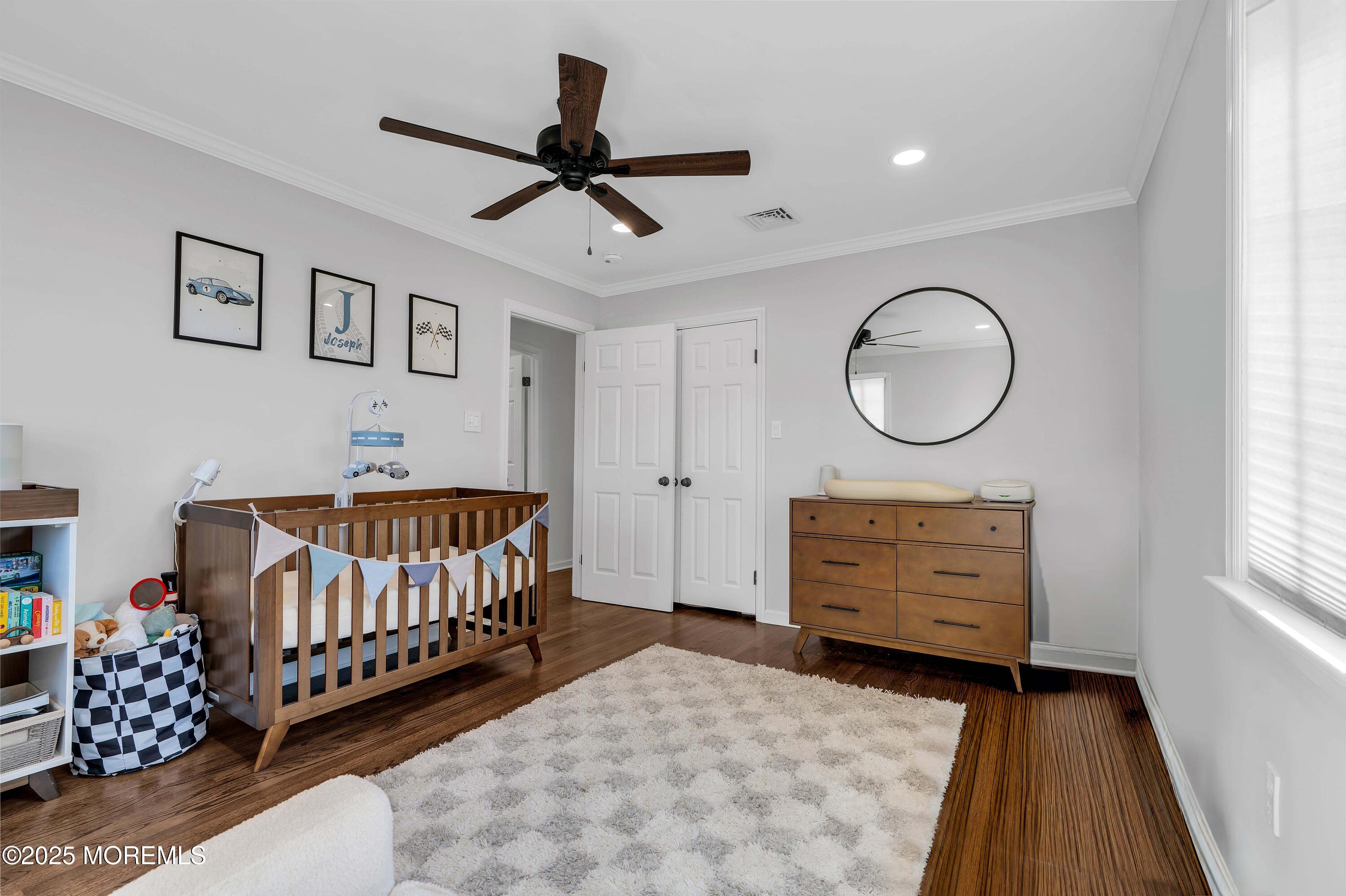 520 Windsor Street Forked River, NJ 08731 - Photo 22 of 36 a bedroom with a bed window and a dresser