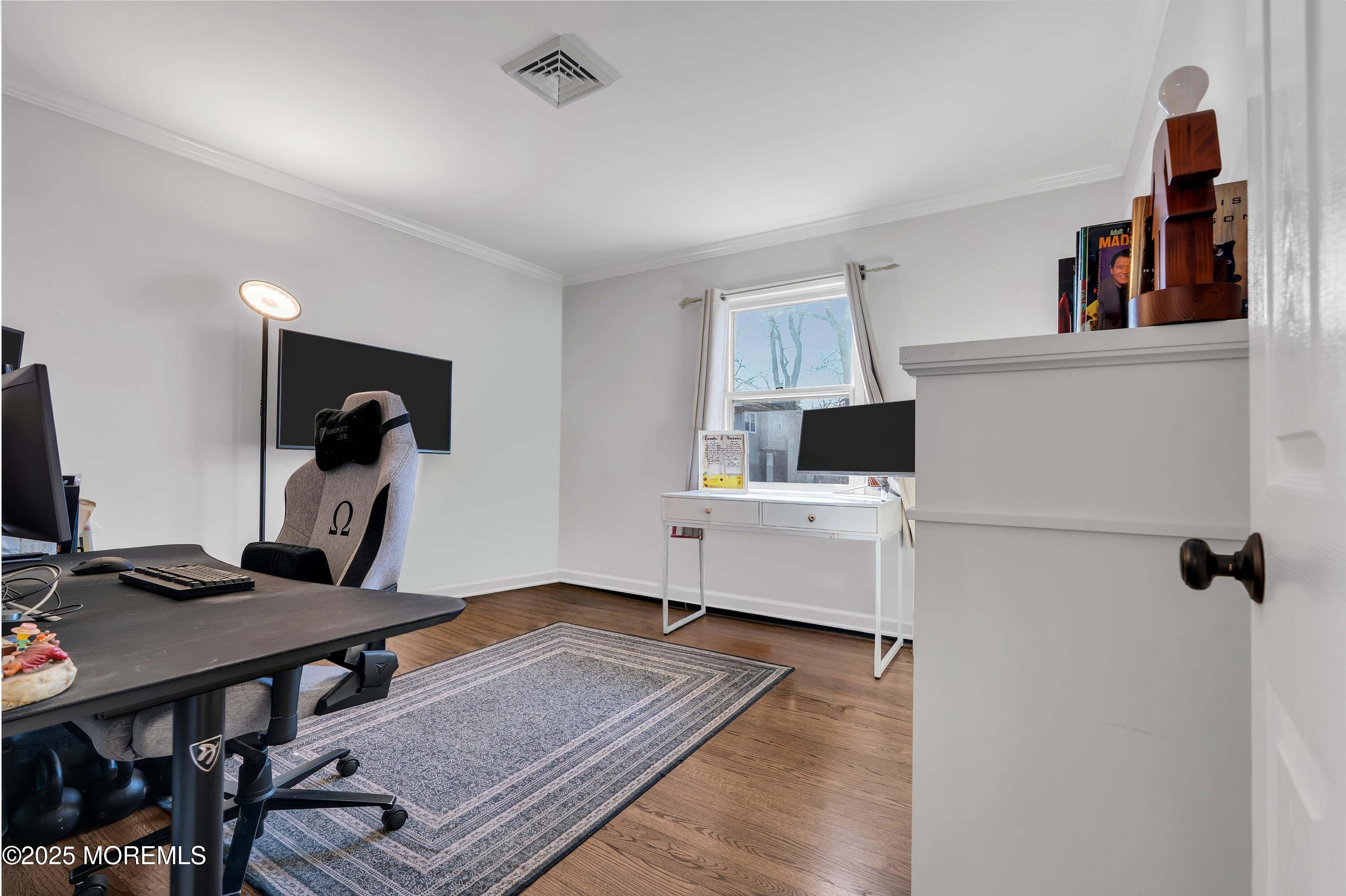 520 Windsor Street Forked River, NJ 08731 - Photo 29 of 36 a bedroom with furniture and a window