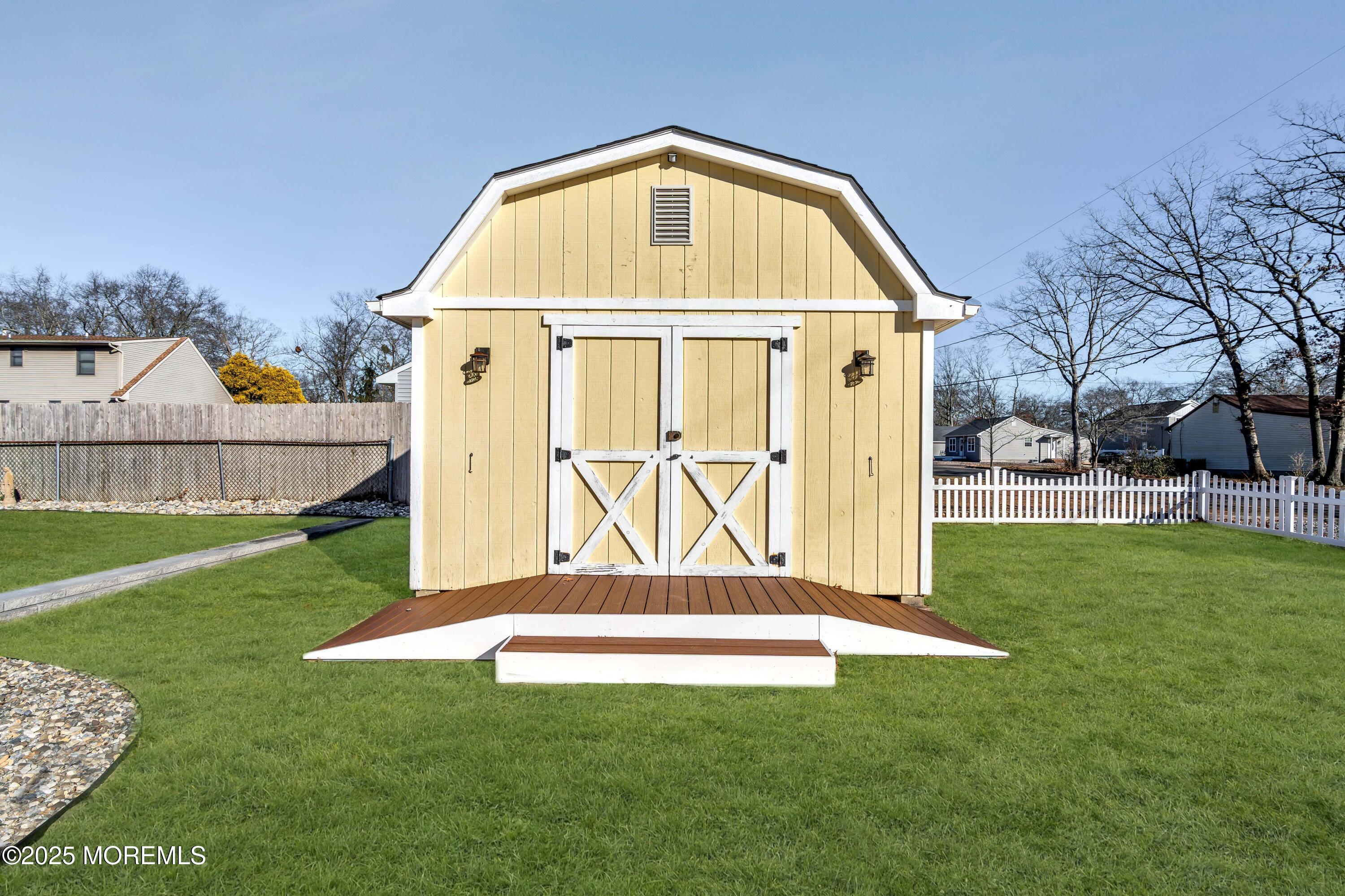 520 Windsor Street Forked River, NJ 08731 - Photo 31 of 36 a view of a tiny house with a yard