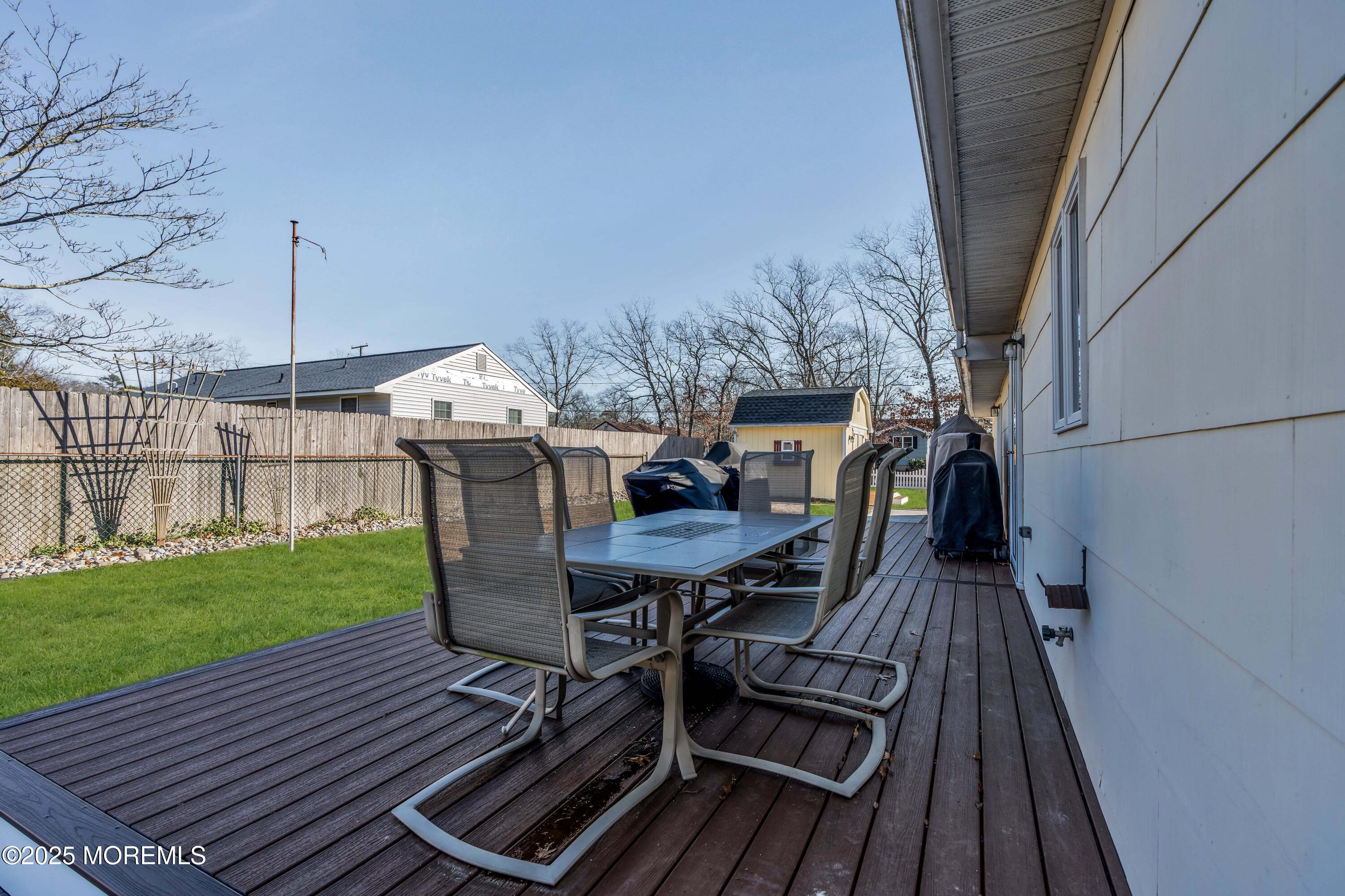 520 Windsor Street Forked River, NJ 08731 - Photo 35 of 36 a view of a chairs and table on the roof deck