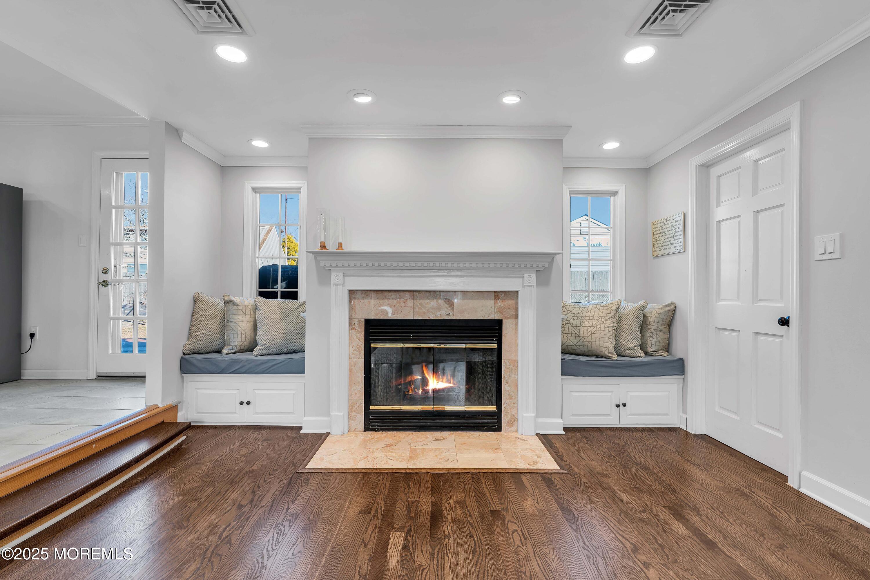520 Windsor Street Forked River, NJ 08731 - Photo 4 of 36 a living room with furniture and a fireplace