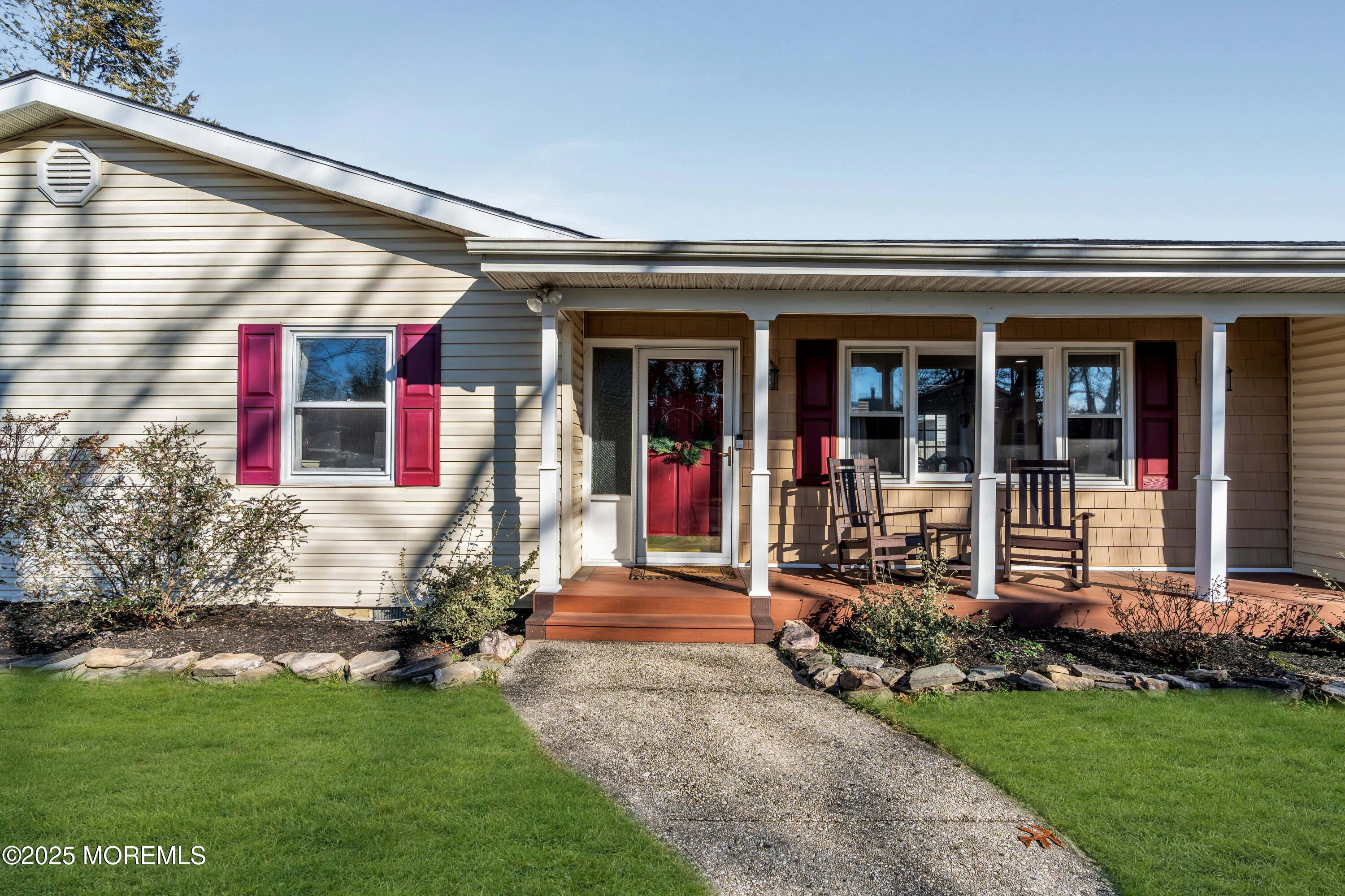 520 Windsor Street Forked River, NJ 08731 - Photo 8 of 36 front view of a house with a yard