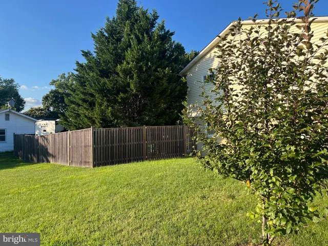 a view of garden with a small pool