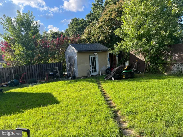 a view of a backyard with a garden