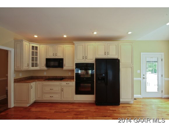 1834 Hermitage Road Waynesboro, VA 22980 - Photo 8 of 32 a living room with stainless steel appliances kitchen island granite countertop a refrigerator and a sink