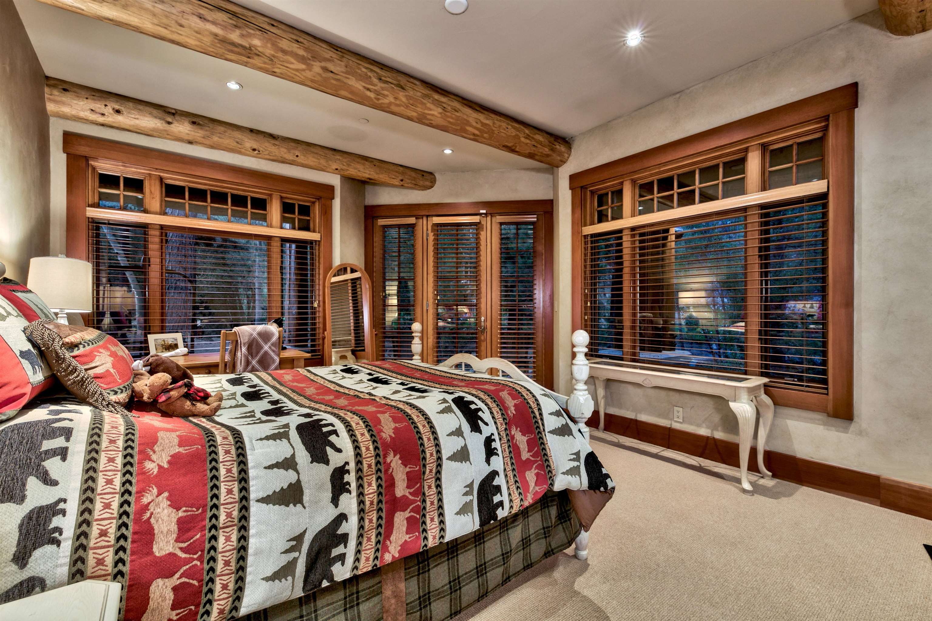 244 Hidden Lake Loop Olympic Valley, CA 96146 - Photo 16 of 20 a bed sitting in front of a balcony