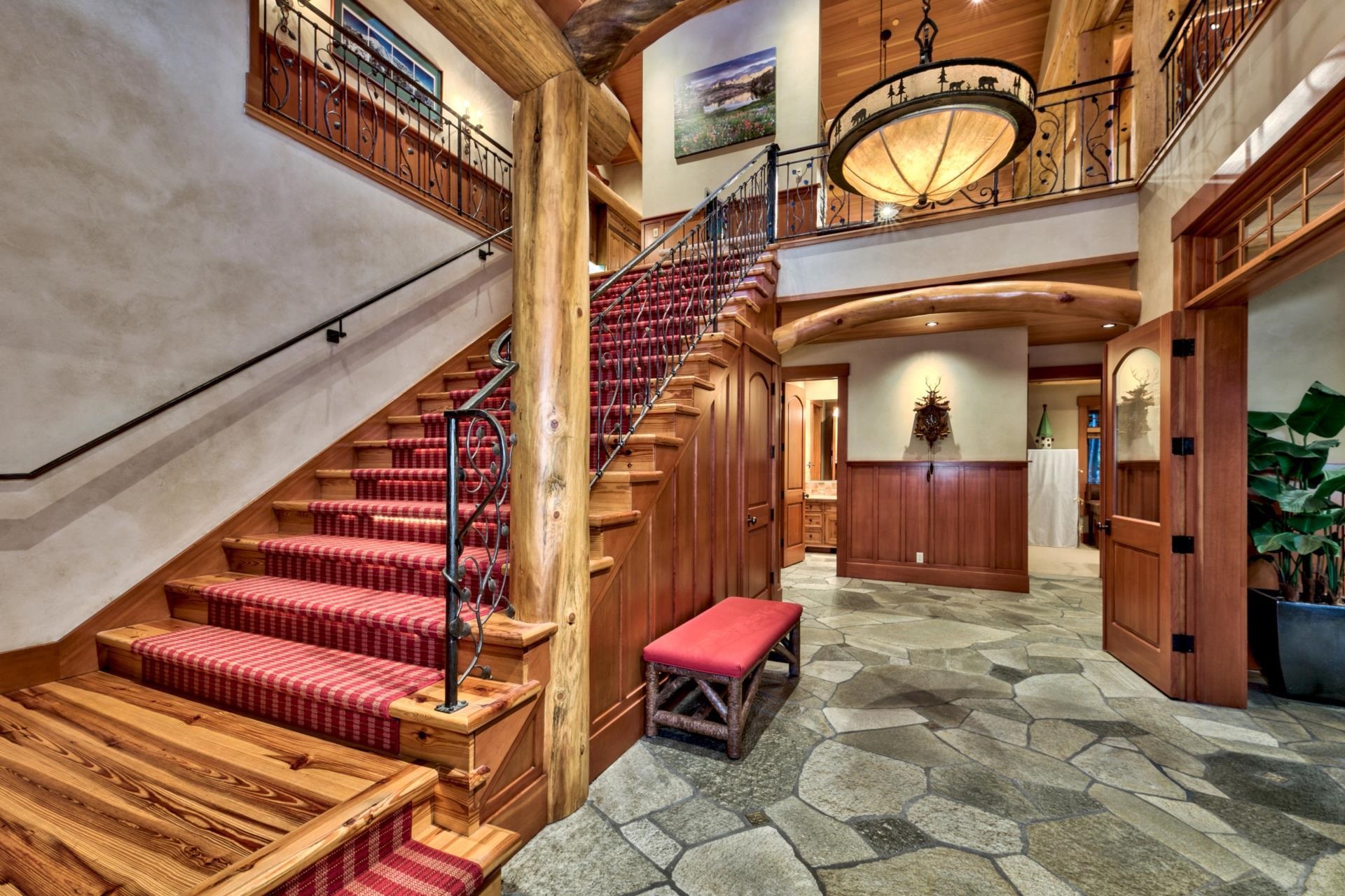 244 Hidden Lake Loop Olympic Valley, CA 96146 - Photo 10 of 20 a view of a chairs with entryway in front of building