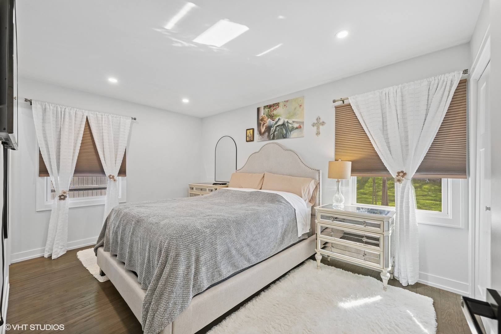 1045 Green Bay Road Lake Bluff, IL 60044 - Photo 14 of 22 a bedroom with a bed next to a large window