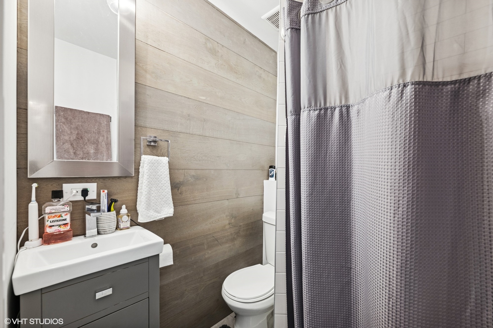 1045 Green Bay Road Lake Bluff, IL 60044 - Photo 19 of 22 a bathroom with a sink a toilet and shower