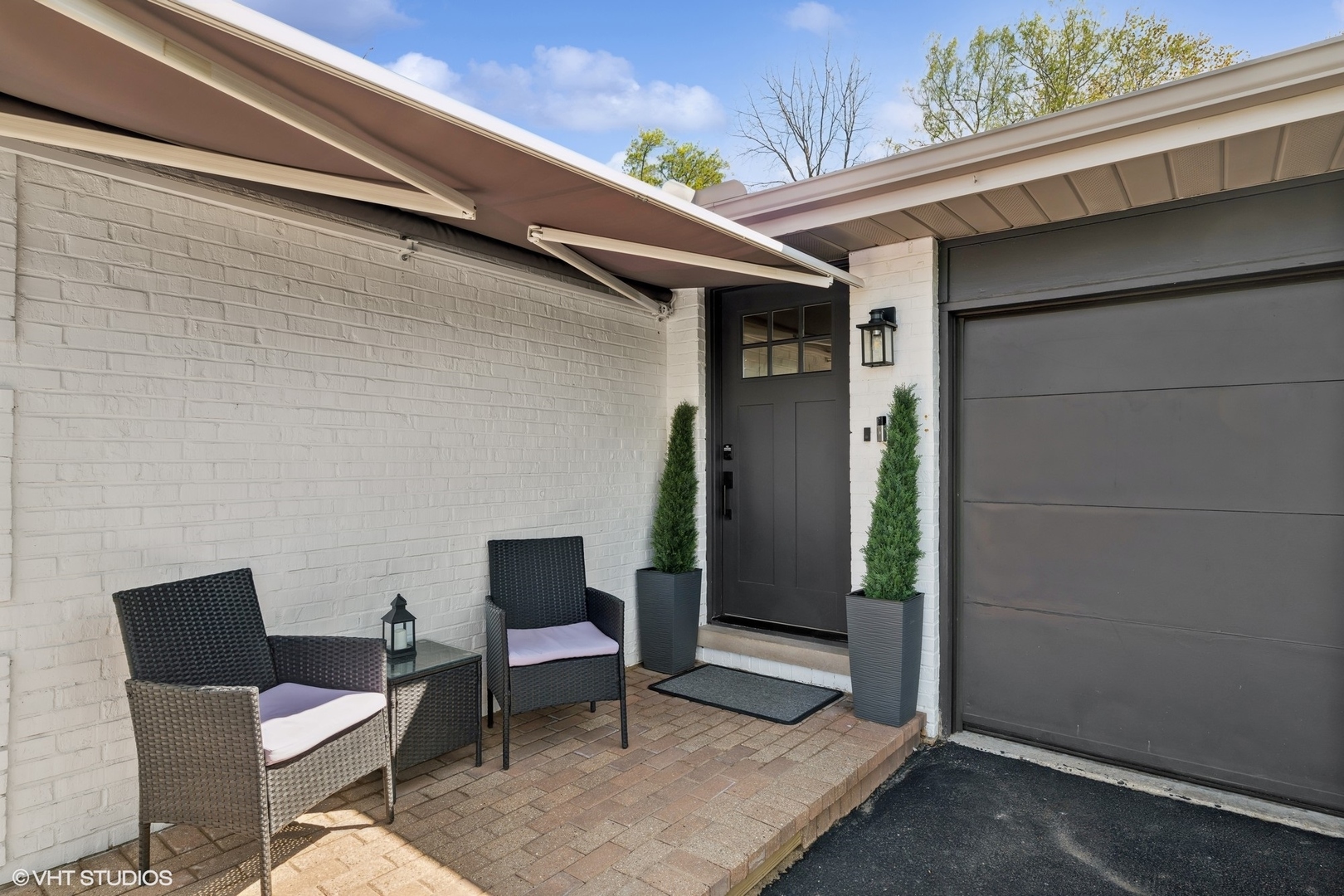 1045 Green Bay Road Lake Bluff, IL 60044 - Photo 3 of 22 a couple of chairs in front of a door