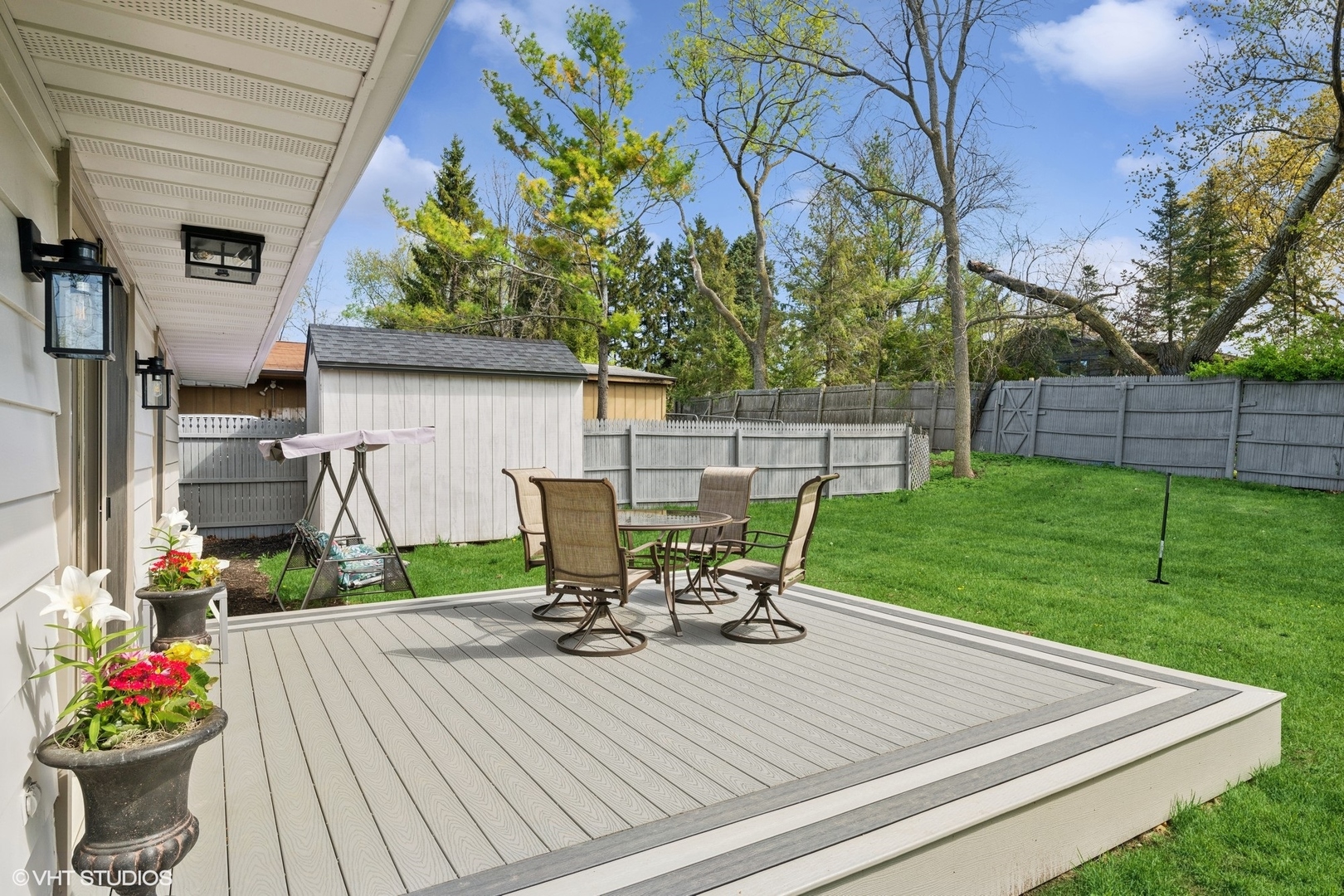 1045 Green Bay Road Lake Bluff, IL 60044 - Photo 4 of 22 a view of a chair and table in backyard of the house