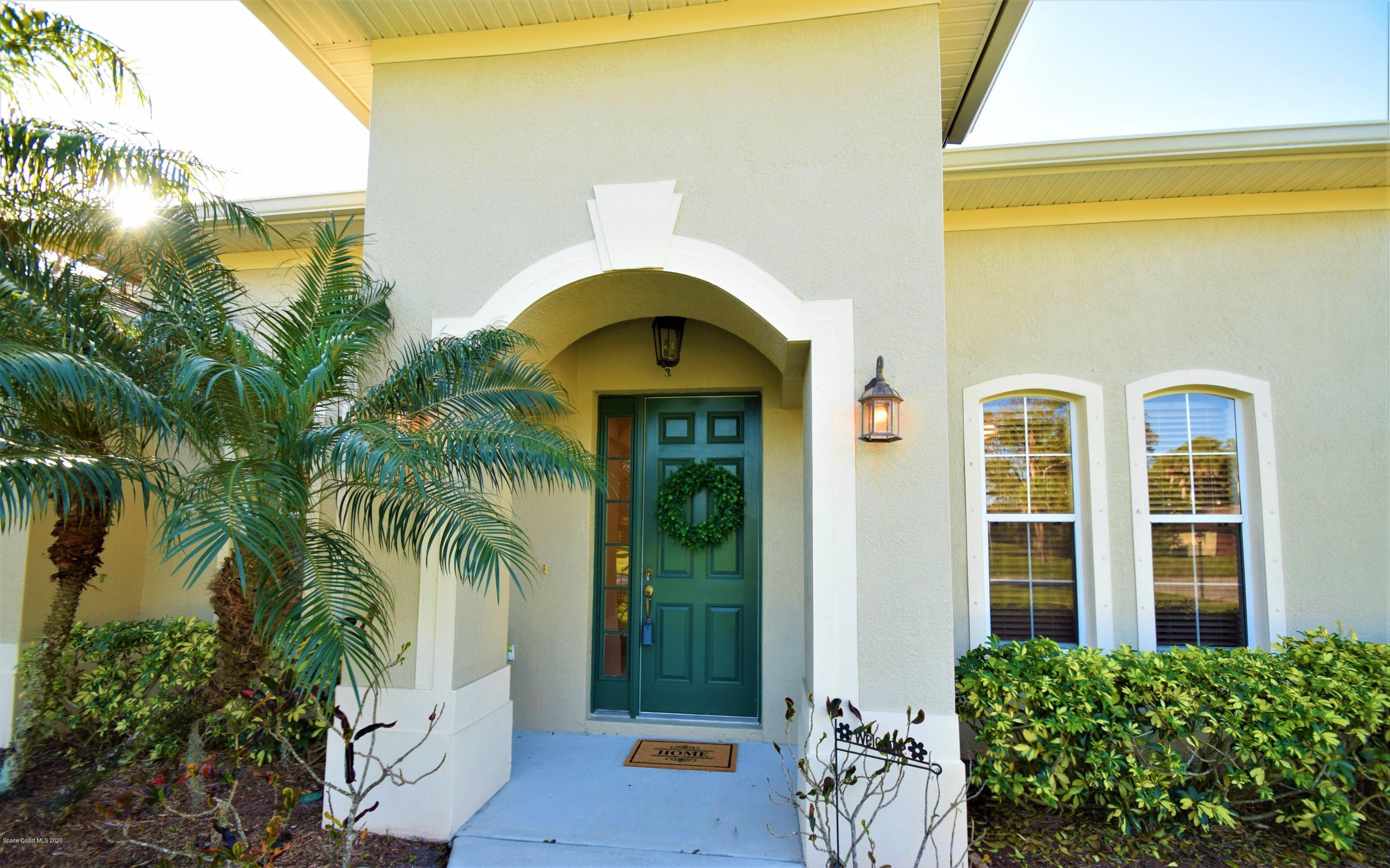 836 Riviera Drive Northeast Palm Bay, FL 32905 - Photo 3 of 75 Inviting Entry