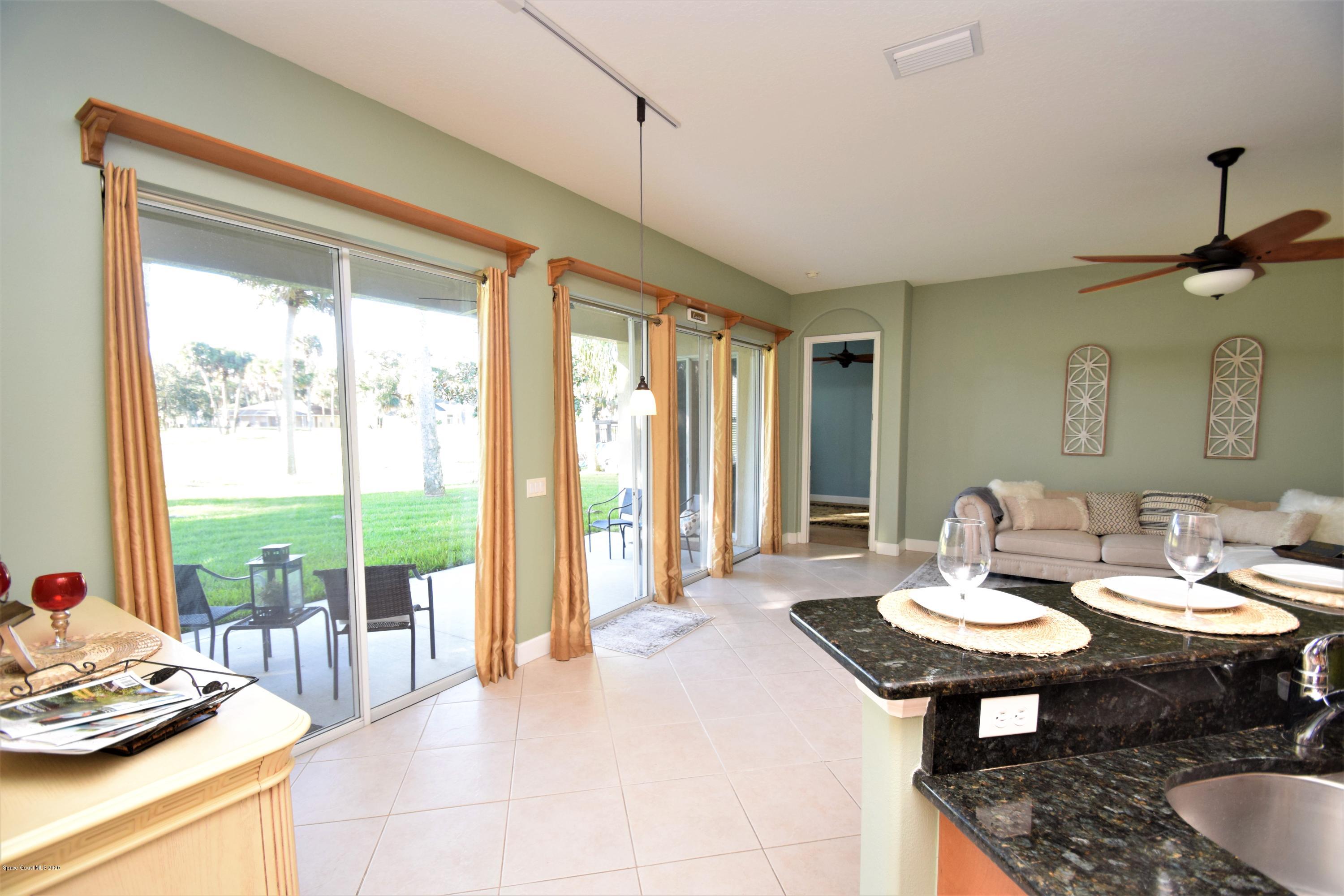 836 Riviera Drive Northeast Palm Bay, FL 32905 - Photo 23 of 75 Kitchen open to nook - family room