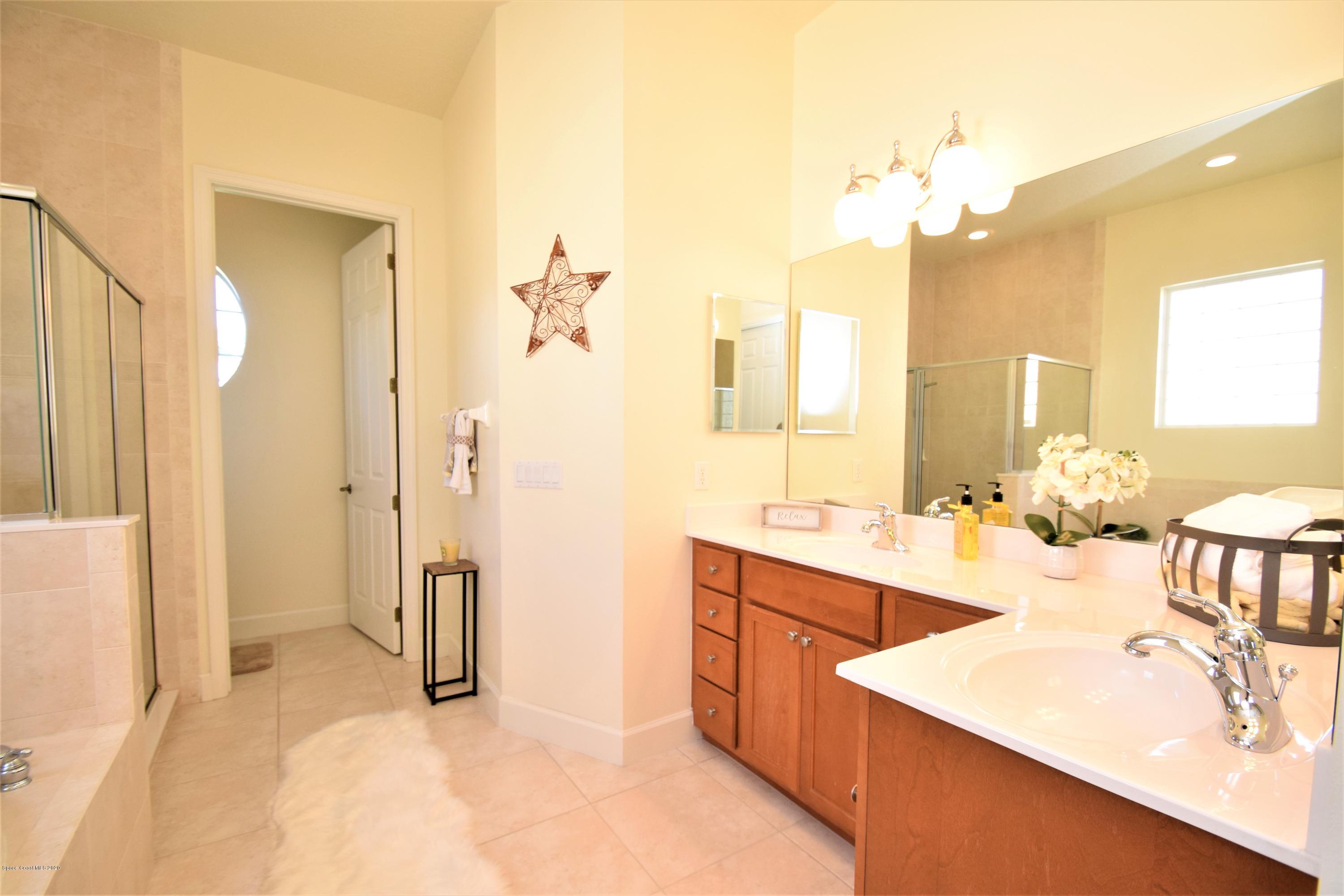 836 Riviera Drive Northeast Palm Bay, FL 32905 - Photo 40 of 75 Master Glamour Bathroom