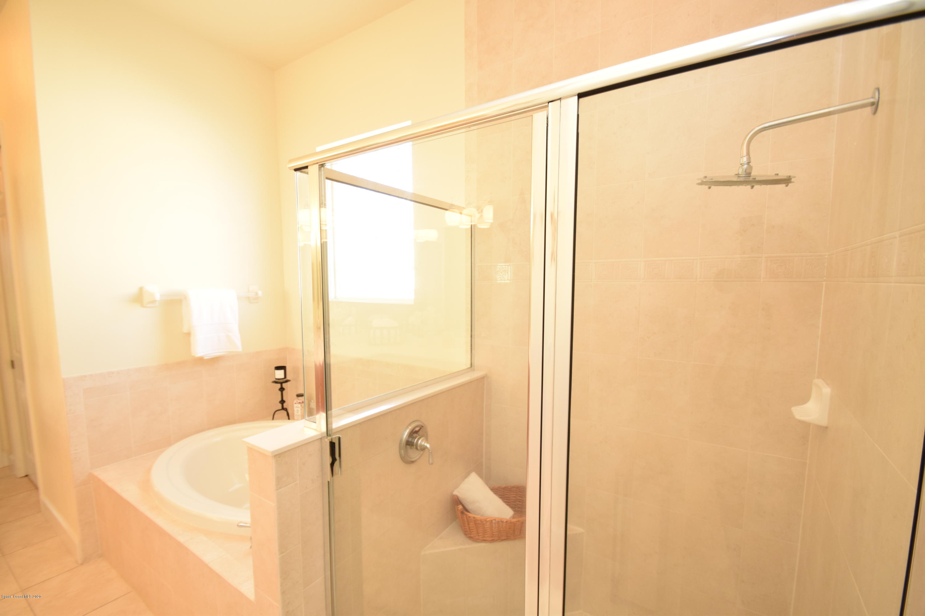 836 Riviera Drive Northeast Palm Bay, FL 32905 - Photo 46 of 75 Soaking tub - tile walk in shower