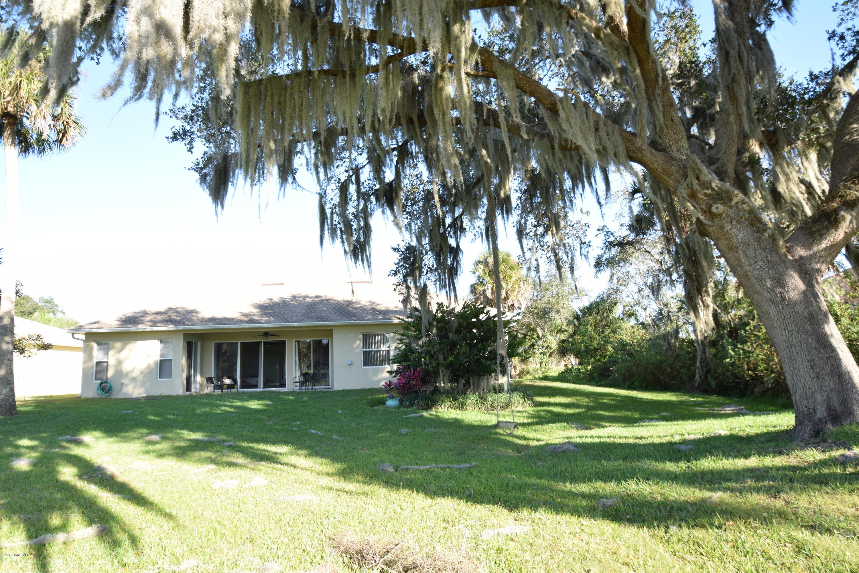 836 Riviera Drive Northeast Palm Bay, FL 32905 - Photo 73 of 75 Rear- side view