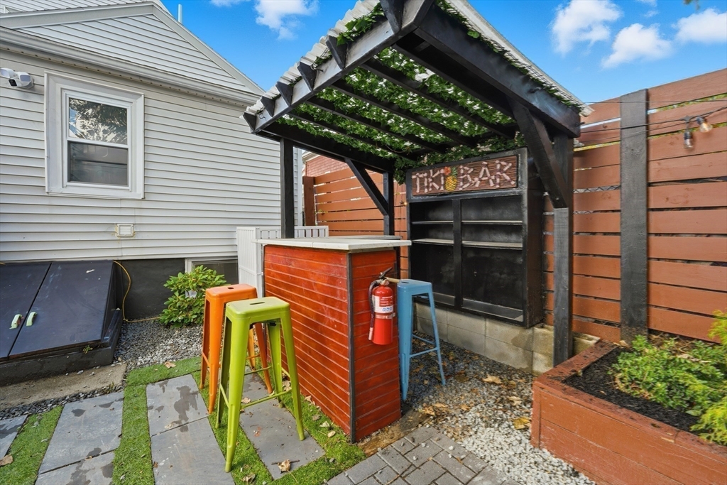 22 Spring Street Everett, MA 02149 - Photo 34 of 40 a view of a entrance gate of the house