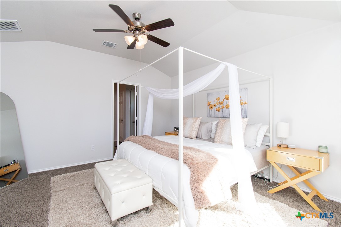 8415 Cantera Rdg Road Temple, TX 76502 - Photo 13 of 24 a living room with a bed furniture and a window