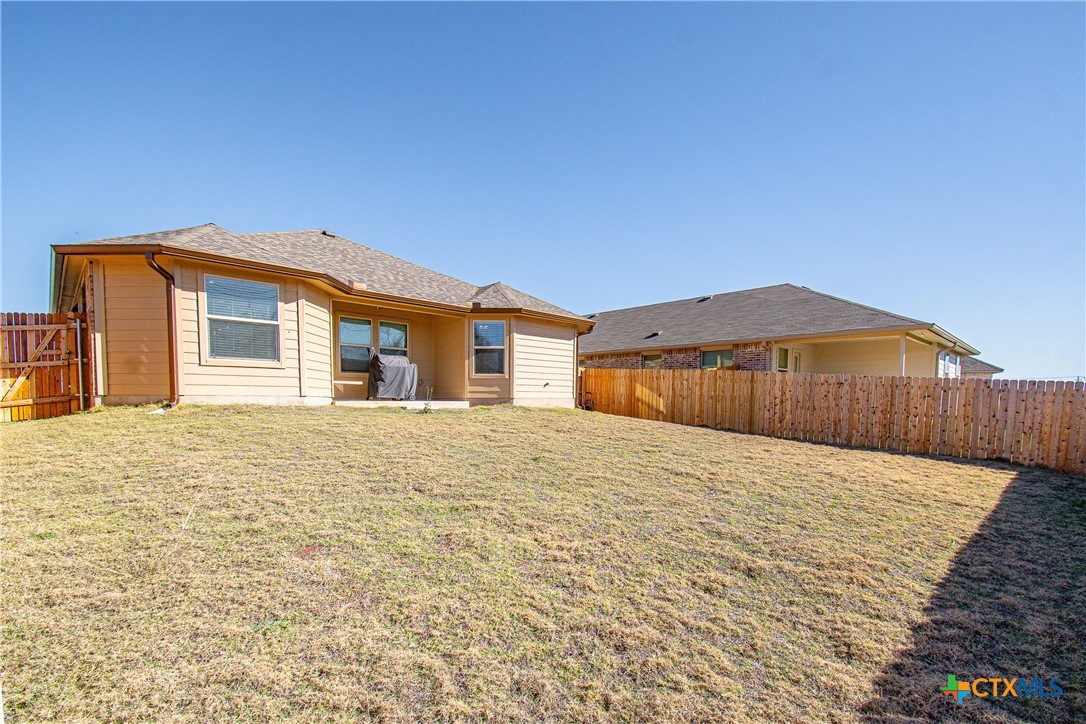 8415 Cantera Rdg Road Temple, TX 76502 - Photo 21 of 24 a big room with wooden cabinet