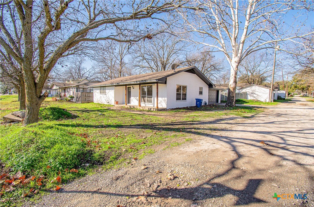 8415 Cantera Rdg Road Temple, TX 76502 - Photo 23 of 24 a view of a house with a big yard and large trees