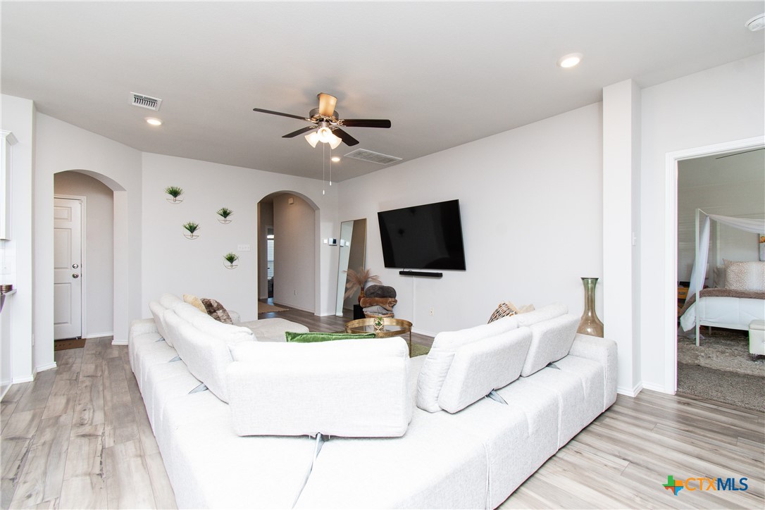 8415 Cantera Rdg Road Temple, TX 76502 - Photo 4 of 24 a living room with furniture and a flat screen tv