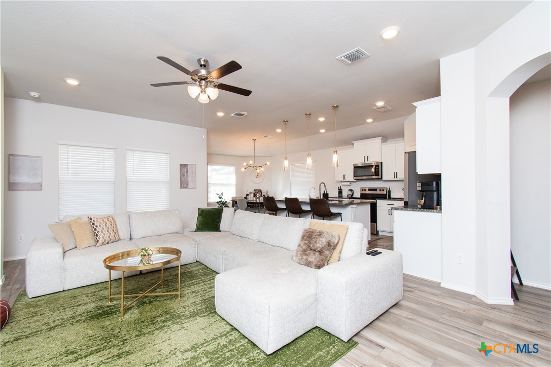 8415 Cantera Rdg Road Temple, TX 76502 - Photo 5 of 24 a living room with furniture and kitchen view