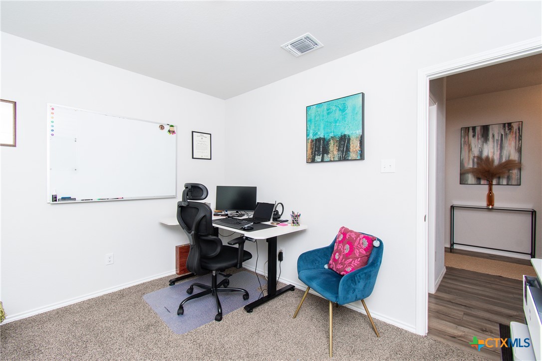 8415 Cantera Rdg Road Temple, TX 76502 - Photo 8 of 24 a view of a workspace with furniture
