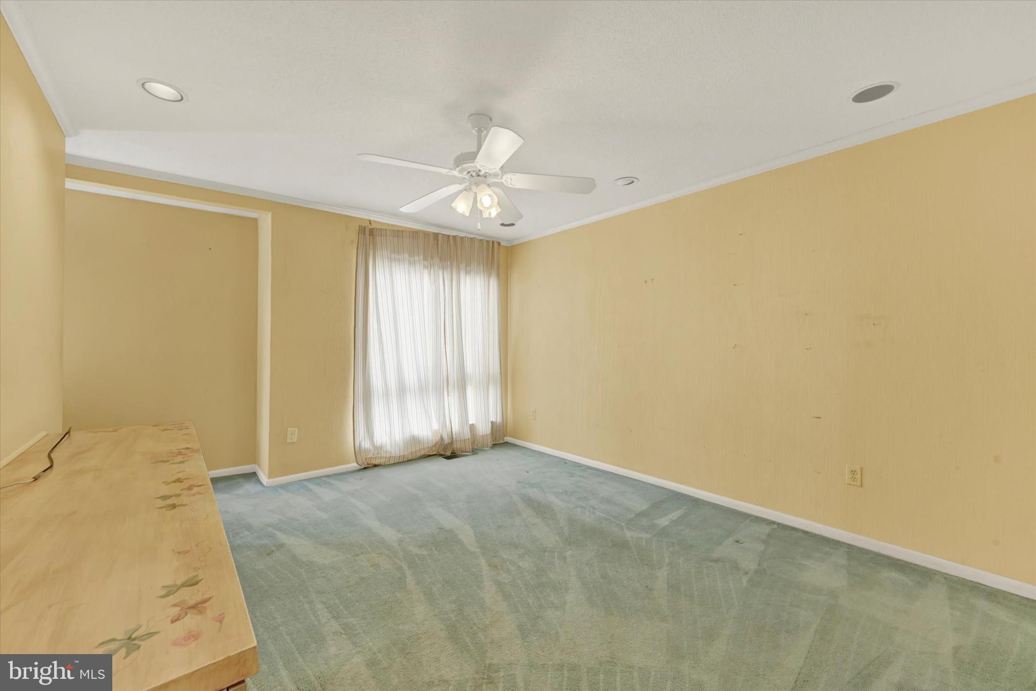25 Tanner Court, Unit H Baltimore, MD 21208 - Photo 22 of 29 a view of an empty room with a window